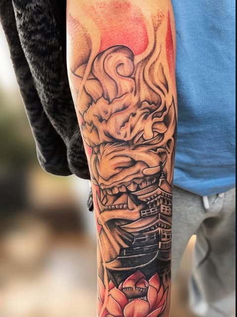 Tatuaje a color en antebrazo, trabajo de ISC Barr Tattoo